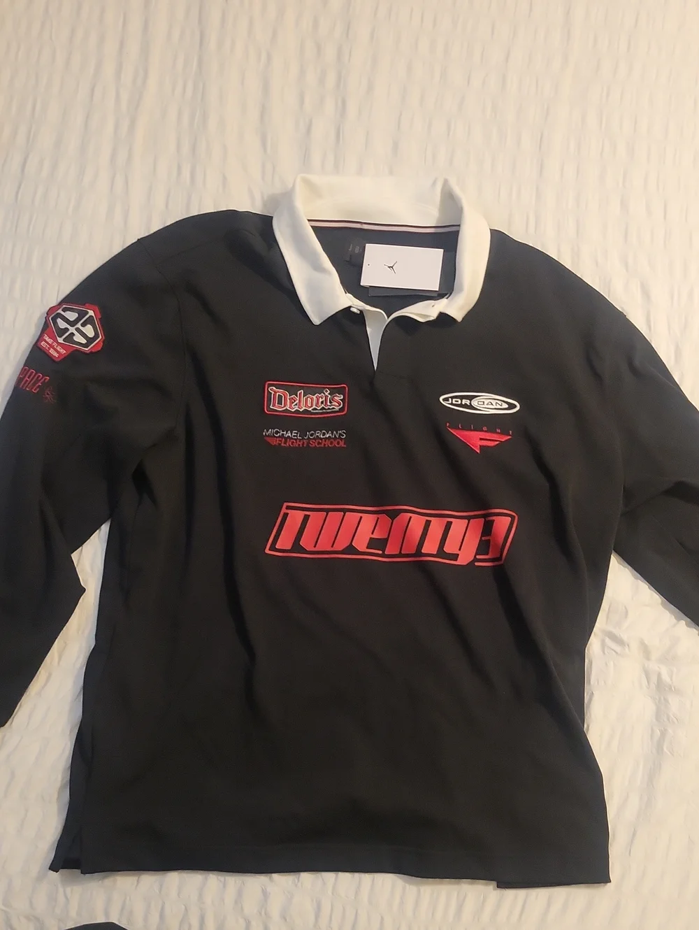 Jordan Black Long-Sleeve Polo with White Collar and Red Graphics